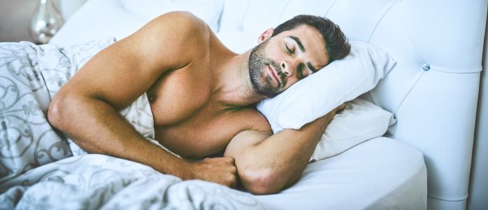 A person practicing good sleep hygiene habits